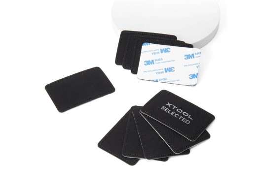 Pegat rectangular de cuir (10 unitats) negre a plata