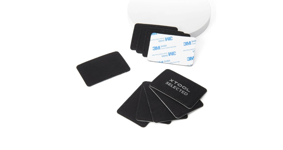 Pegat rectangular de cuir (10 unitats) negre a plata